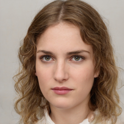 Neutral white young-adult female with medium  brown hair and green eyes