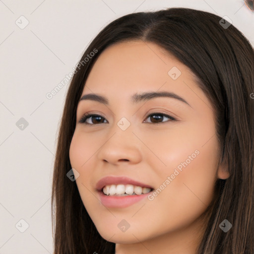 Joyful white young-adult female with long  brown hair and brown eyes