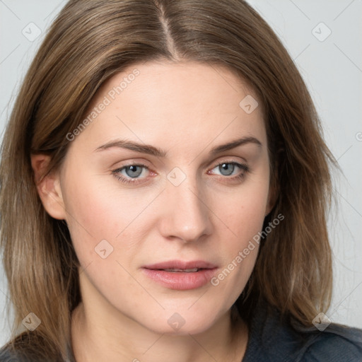 Joyful white young-adult female with medium  brown hair and blue eyes