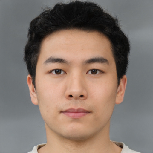Neutral asian young-adult male with short  brown hair and brown eyes