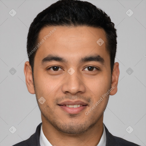 Joyful latino young-adult male with short  black hair and brown eyes