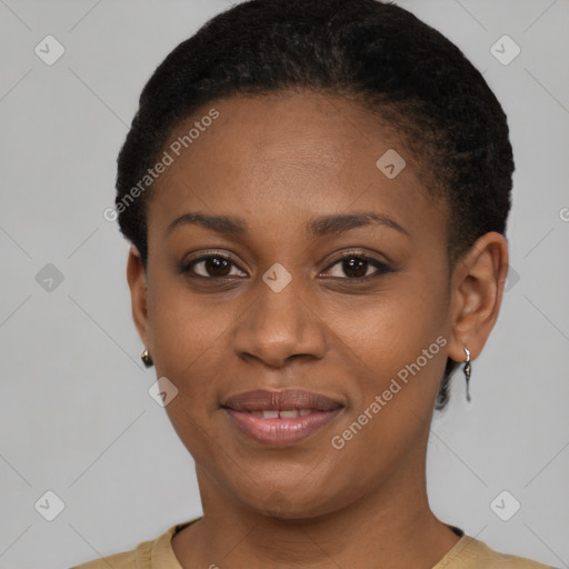 Joyful black young-adult female with short  brown hair and brown eyes