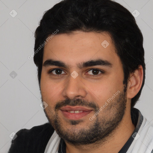 Joyful white young-adult male with short  black hair and brown eyes