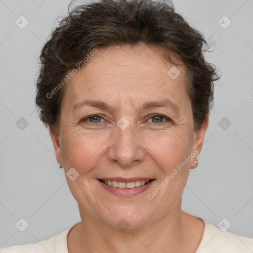 Joyful white adult female with short  brown hair and brown eyes