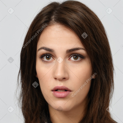 Neutral white young-adult female with long  brown hair and brown eyes