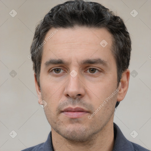 Neutral white adult male with short  black hair and brown eyes