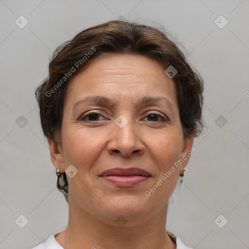 Joyful white adult female with short  brown hair and brown eyes