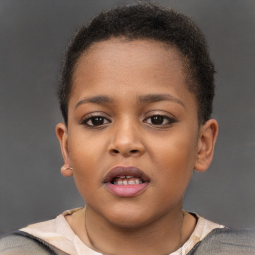 Joyful black child female with short  brown hair and brown eyes