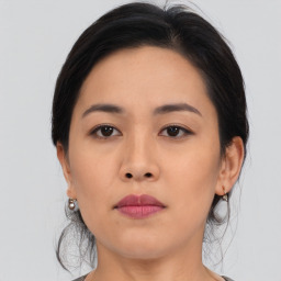 Neutral asian young-adult female with medium  black hair and brown eyes