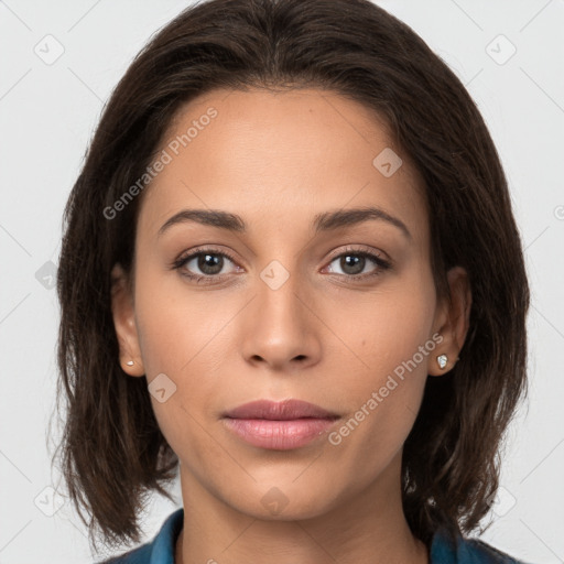 Neutral white young-adult female with medium  brown hair and brown eyes