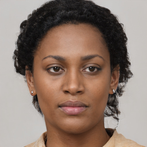 Neutral black young-adult female with short  brown hair and brown eyes