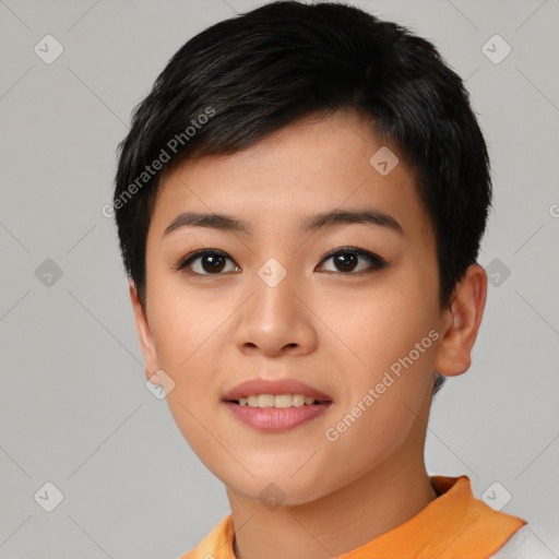 Joyful asian young-adult female with short  black hair and brown eyes