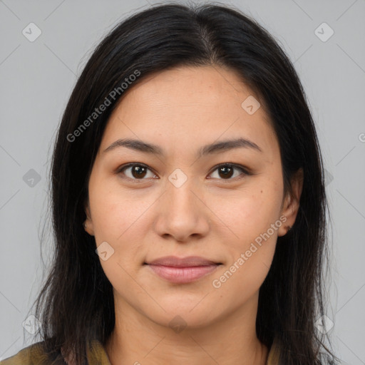 Joyful latino young-adult female with long  brown hair and brown eyes