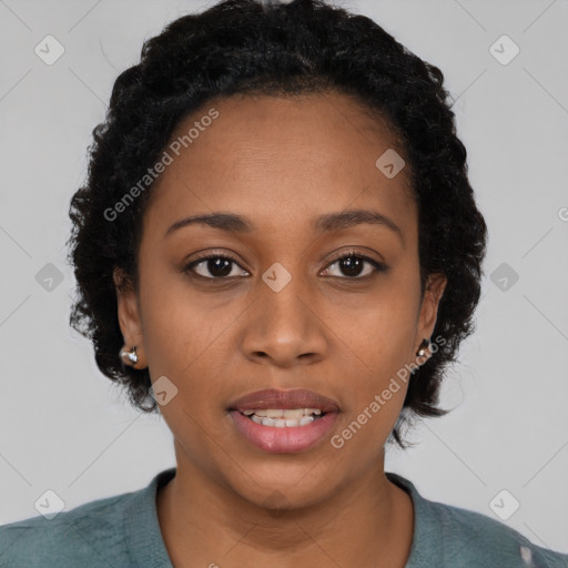 Joyful black young-adult female with short  black hair and brown eyes