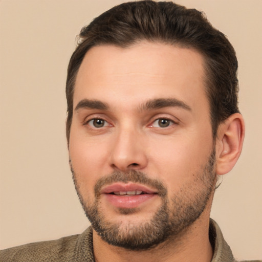 Joyful white young-adult male with short  brown hair and brown eyes