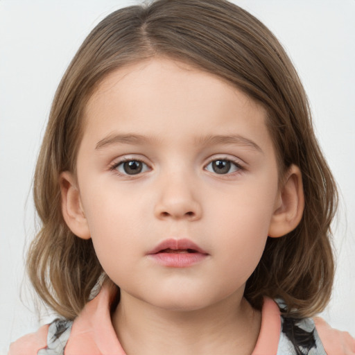 Neutral white child female with medium  brown hair and brown eyes