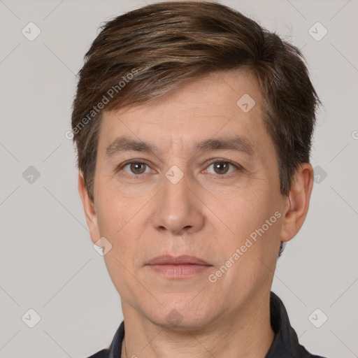 Neutral white adult male with short  brown hair and brown eyes