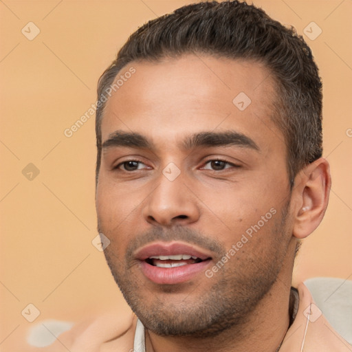 Joyful white young-adult male with short  black hair and brown eyes