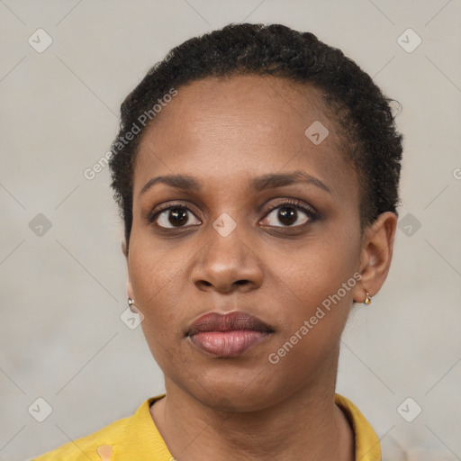 Neutral black young-adult female with short  brown hair and brown eyes