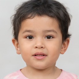 Joyful white child male with short  brown hair and brown eyes