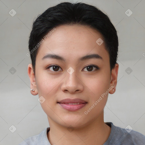 Joyful asian young-adult female with short  black hair and brown eyes