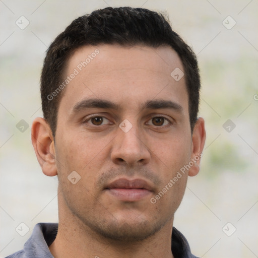 Neutral white young-adult male with short  brown hair and brown eyes