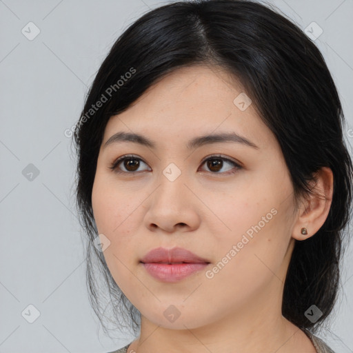 Joyful asian young-adult female with medium  black hair and brown eyes