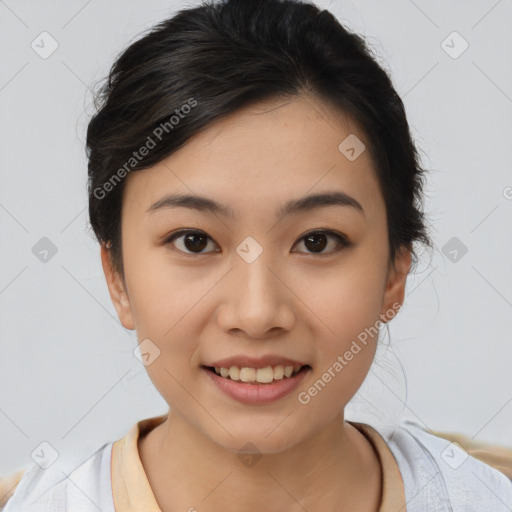 Joyful asian young-adult female with medium  black hair and brown eyes