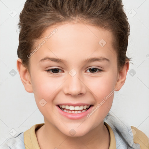 Joyful white child female with short  brown hair and brown eyes