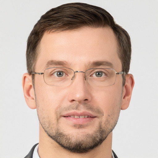 Joyful white adult male with short  brown hair and brown eyes