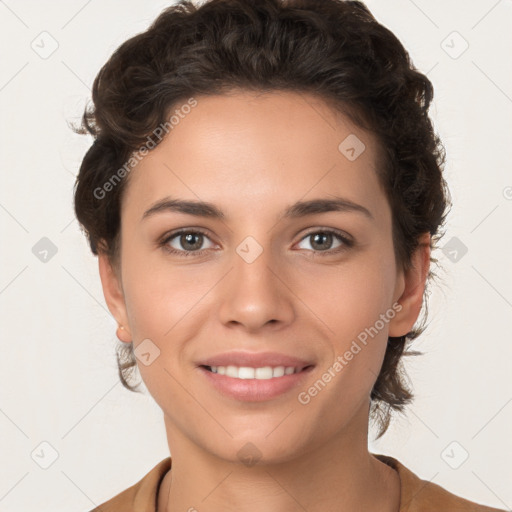 Joyful white young-adult female with short  brown hair and brown eyes