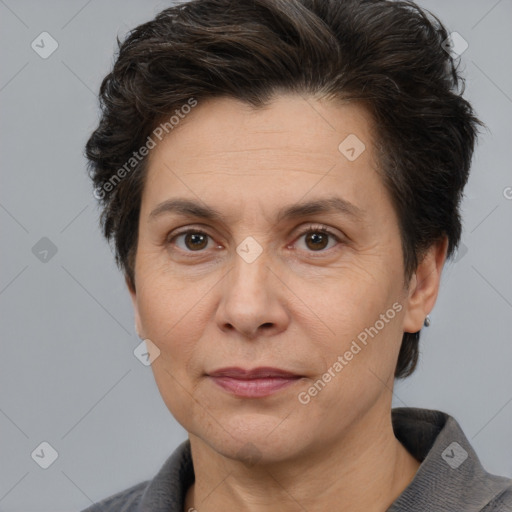 Joyful white adult female with short  brown hair and brown eyes