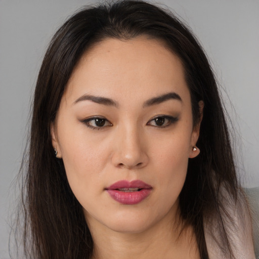 Neutral latino young-adult female with long  brown hair and brown eyes