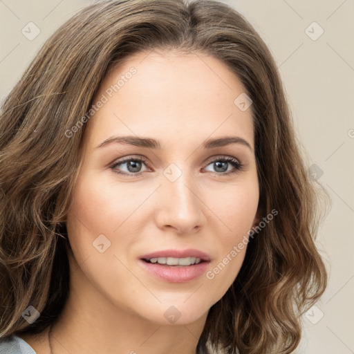 Joyful white young-adult female with long  brown hair and green eyes