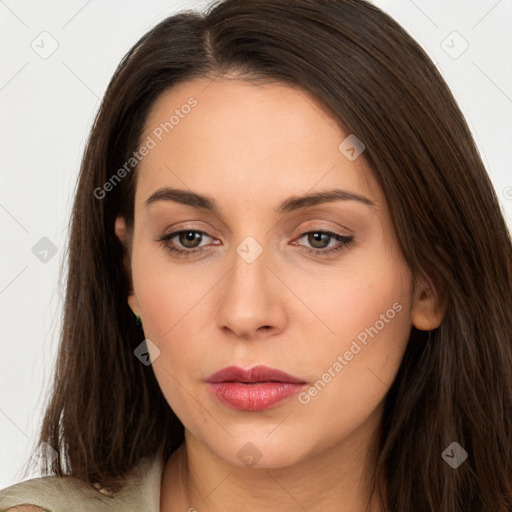 Neutral white young-adult female with long  brown hair and brown eyes