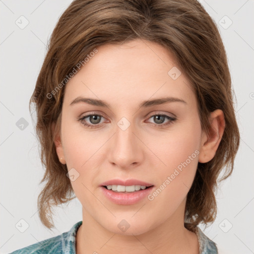 Joyful white young-adult female with medium  brown hair and green eyes