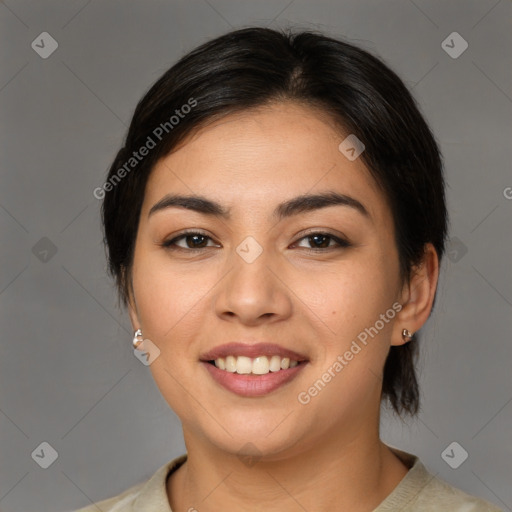 Joyful latino young-adult female with medium  brown hair and brown eyes