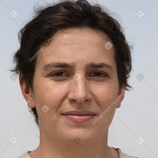 Joyful white adult female with short  brown hair and brown eyes