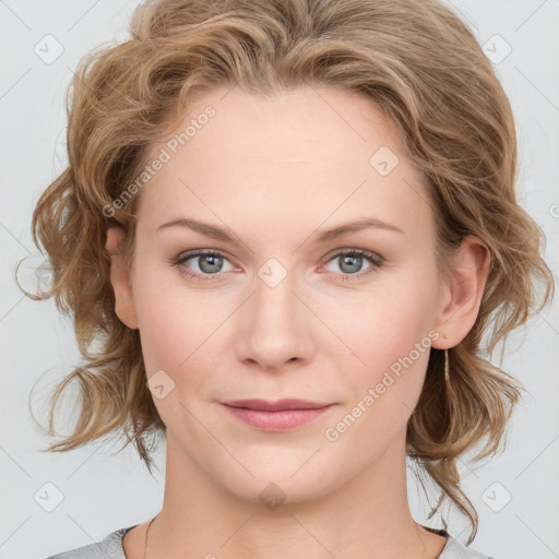 Joyful white young-adult female with medium  brown hair and blue eyes