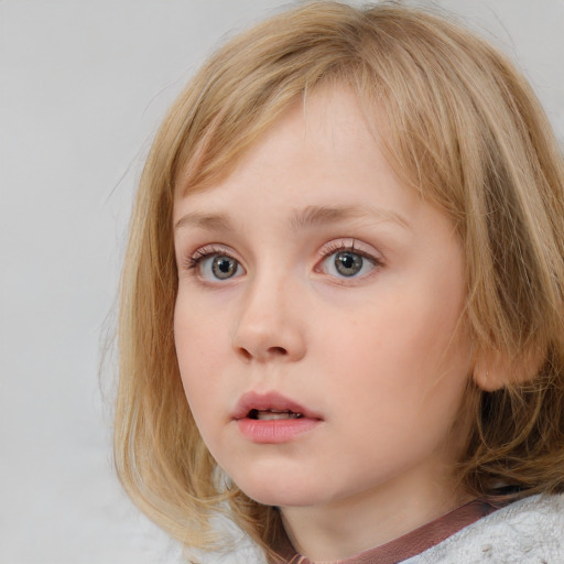 Neutral white child female with medium  brown hair and blue eyes