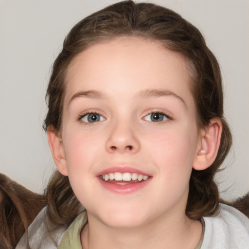 Joyful white child female with medium  brown hair and brown eyes