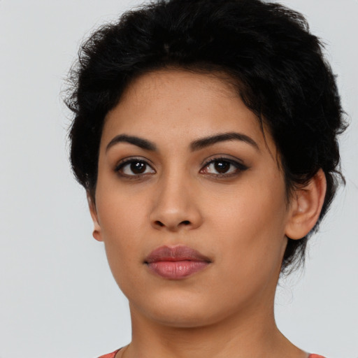 Neutral latino young-adult female with short  black hair and brown eyes