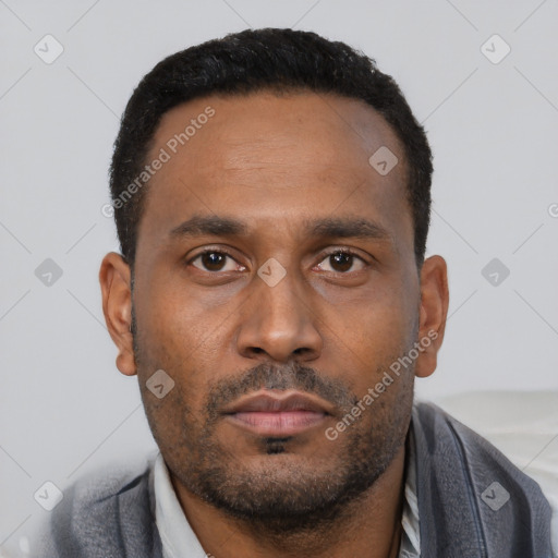 Neutral latino young-adult male with short  black hair and brown eyes