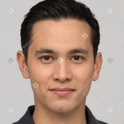 Joyful white young-adult male with short  black hair and brown eyes