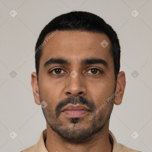 Neutral latino young-adult male with short  black hair and brown eyes