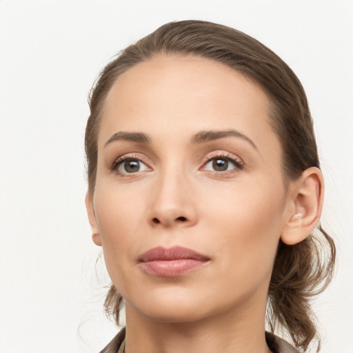 Neutral white young-adult female with long  brown hair and brown eyes