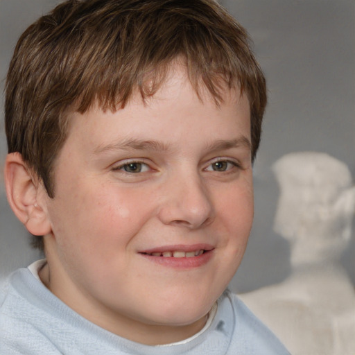 Joyful white child male with short  brown hair and grey eyes