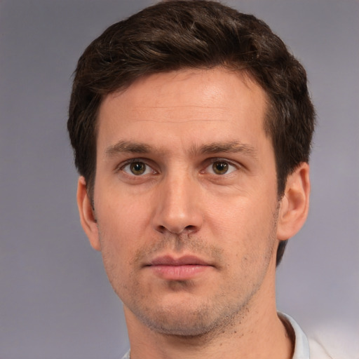 Neutral white adult male with short  brown hair and brown eyes