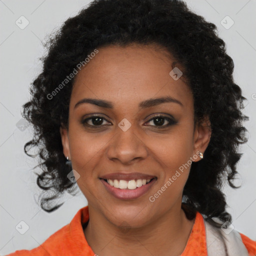 Joyful black young-adult female with medium  brown hair and brown eyes