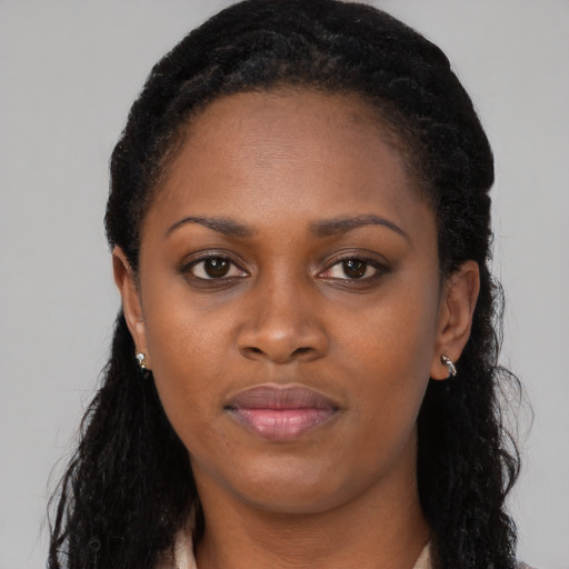 Neutral black young-adult female with long  black hair and brown eyes